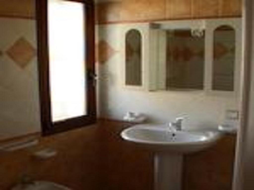 Appartamenti Marilu La Caletta Quarto foto